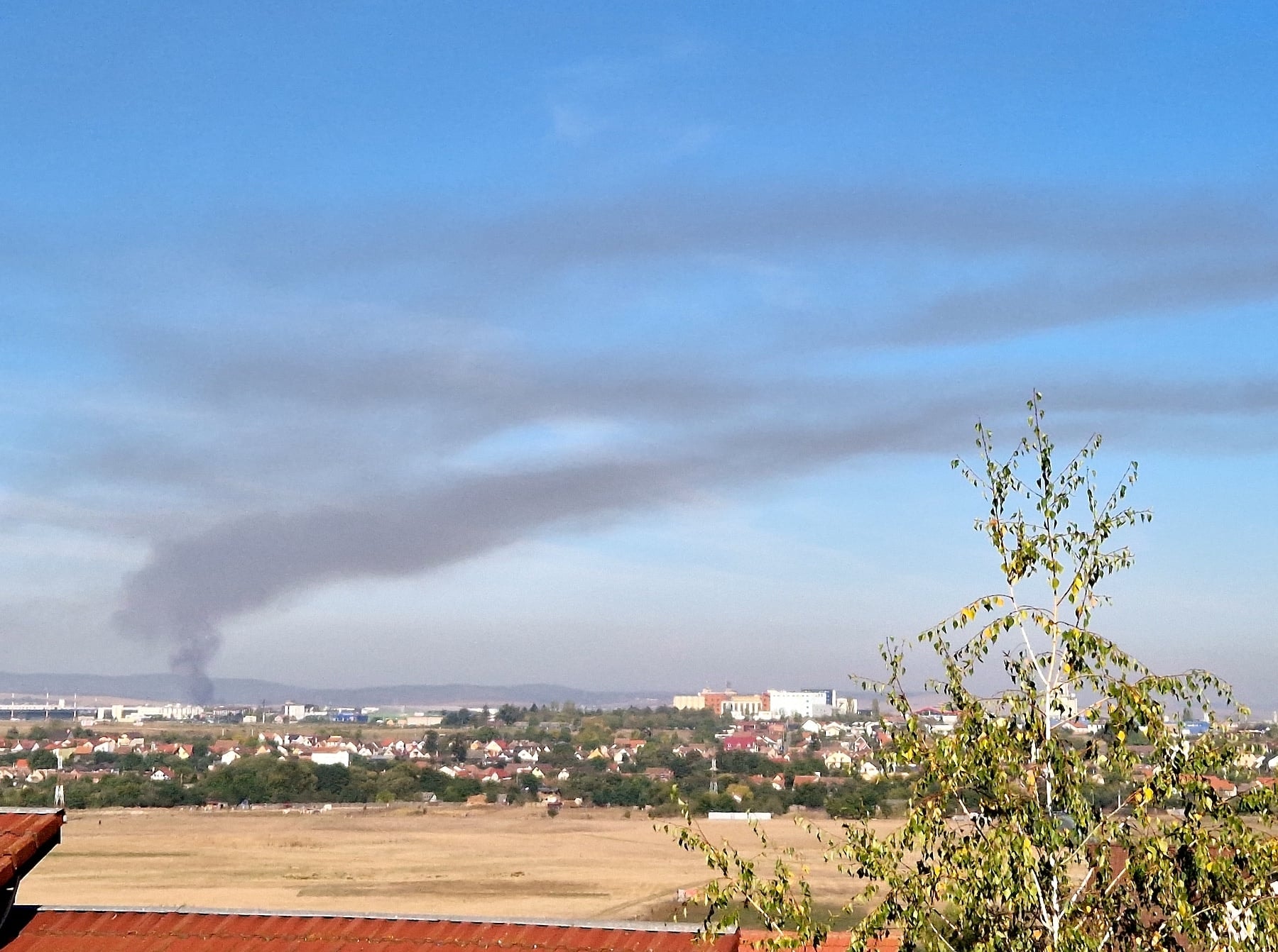 Nor gros de fum negru